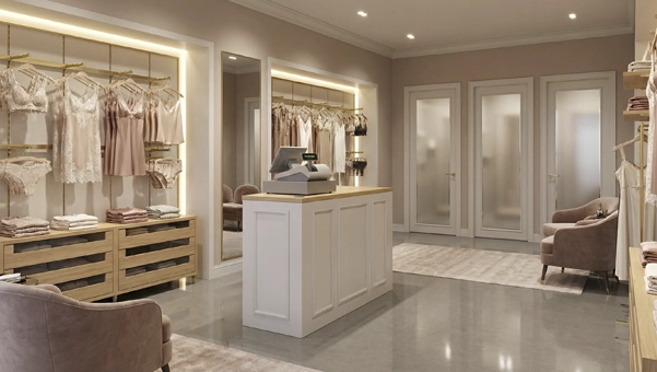 Tienda boutique de lencería con el mostrador blanco de 133 x 68 cm fabricado con madera FSC de Inretail